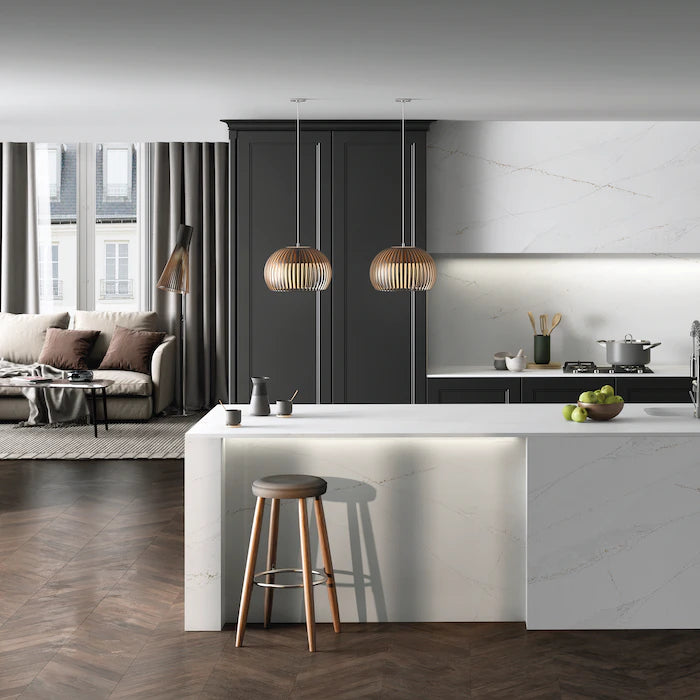 Silestone Ethereal Glow kitchen island with white marble-look finish and waterfall edge — engineered quartz countertops fabricated and installed by Signature...