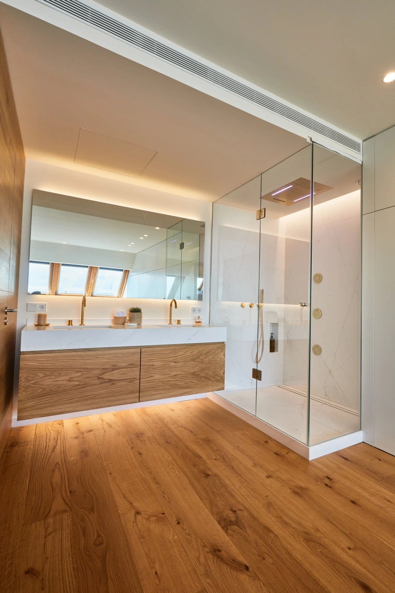 Silestone Ethereal Glow bathroom vanity with white marble-look finish and integrated sink — engineered quartz countertops fabricated and installed by Signatu...
