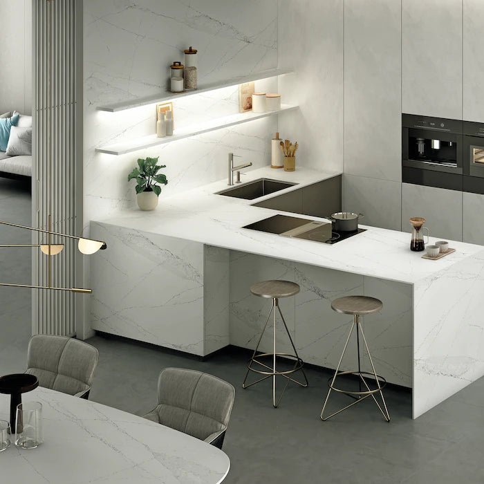 Silestone Ethereal Haze kitchen island with white marble-look veining and waterfall edge — engineered quartz countertops fabricated and installed by Signatur...