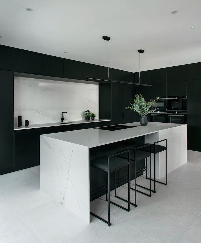 Silestone Ethereal Haze quartz island and perimeter countertops with white marble veining in modern dark green kitchen — quartz countertops near me by Signat...