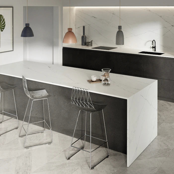 Silestone Ethereal Noctis kitchen island with white marble-look surface and black base — engineered quartz countertops fabricated and installed by Signature ...