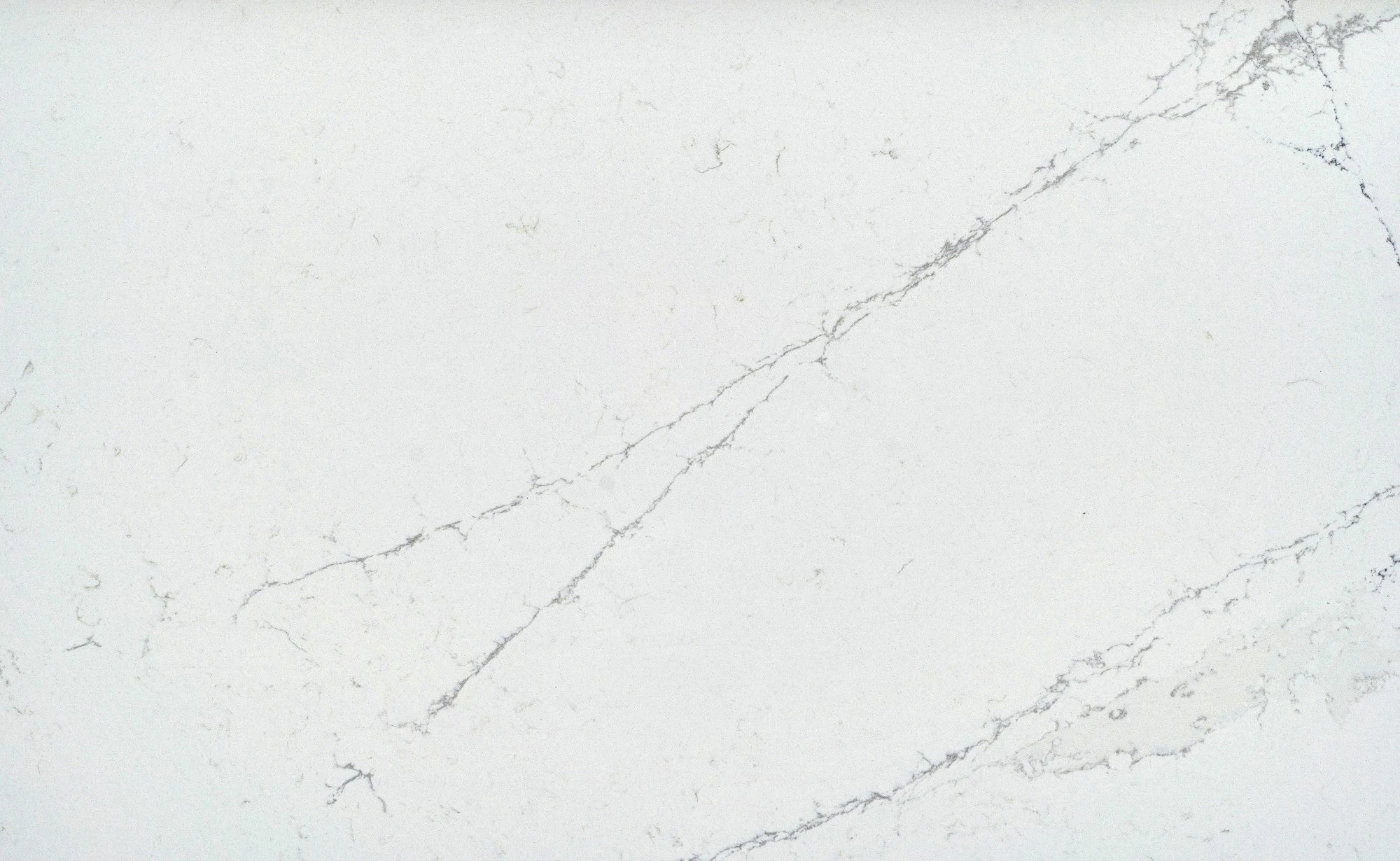 Silestone Ethereal Noctis surface with soft white background and subtle gray veining — engineered quartz countertops fabricated and installed by Signature St...