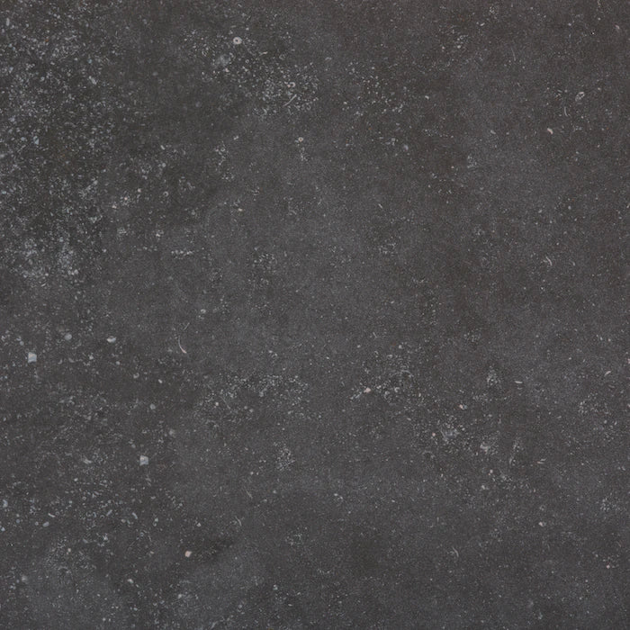 Dekton Fossil surface with dark charcoal gray finish and subtle speckled texture — dekton countertops installed by Signature Stone Las Vegas