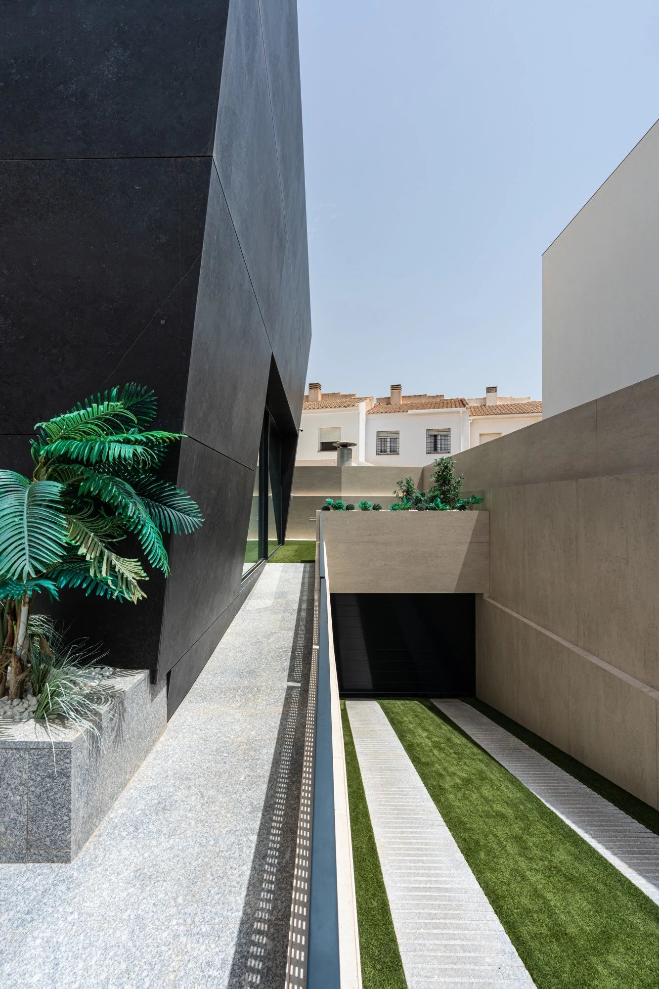 Dekton Fossil exterior cladding with smooth gray finish and modern geometric design — premium dekton countertops installed by Signature Stone Las Vegas
