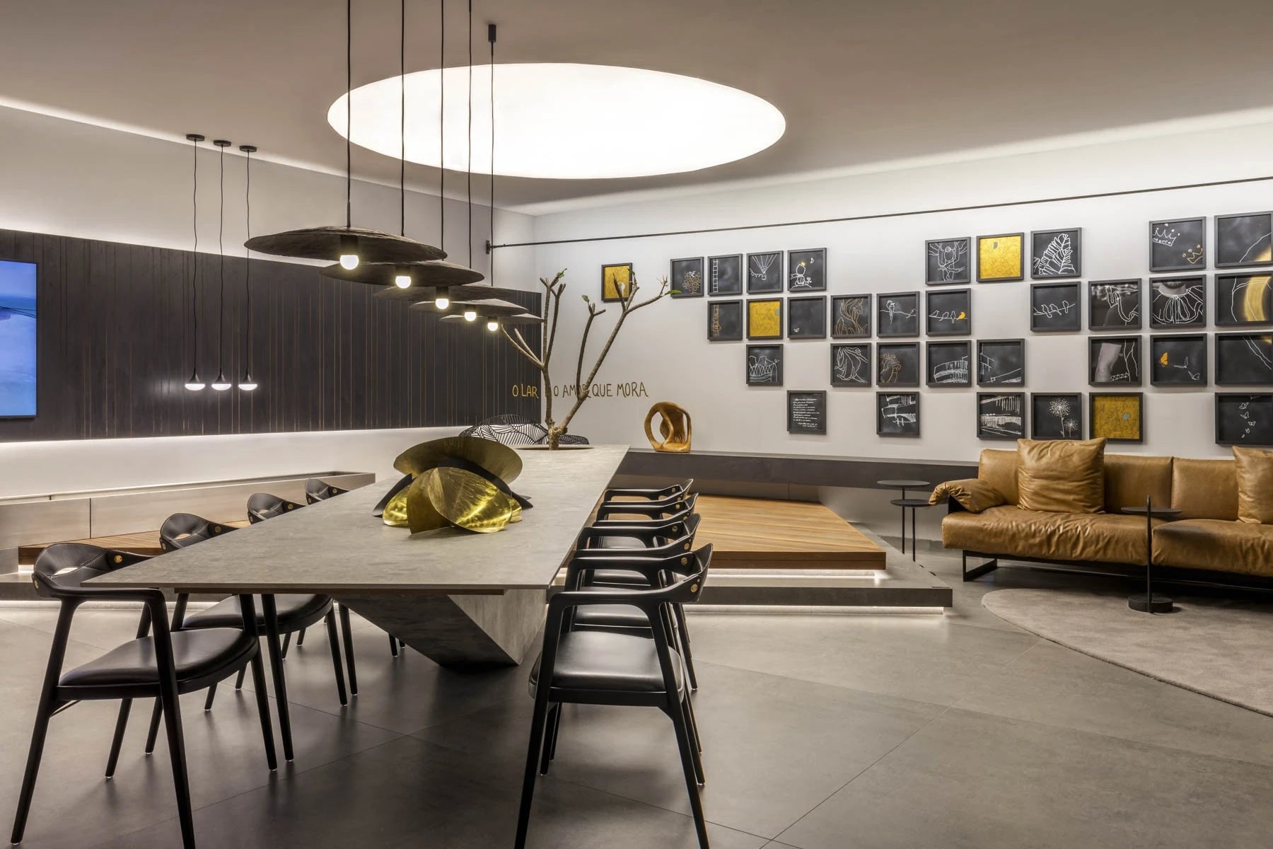 Dekton Ceppo dining table with matte gray finish and sculptural base — premium dekton surfaces fabricated and installed by Signature Stone LV