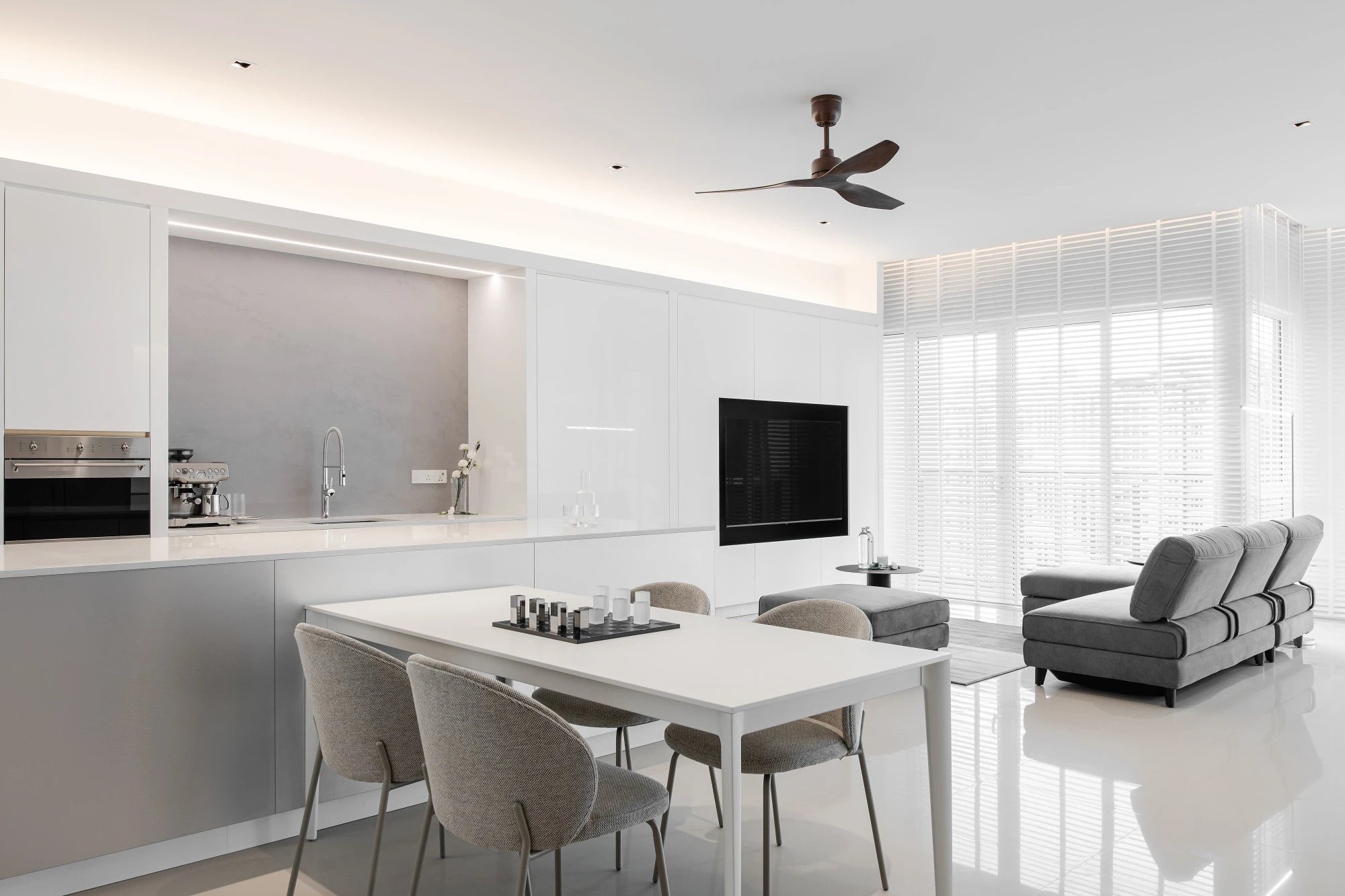Silestone Iconic White kitchen island with waterfall edge and clean white finish — premium quartz countertops installed by Signature Stone Las Vegas