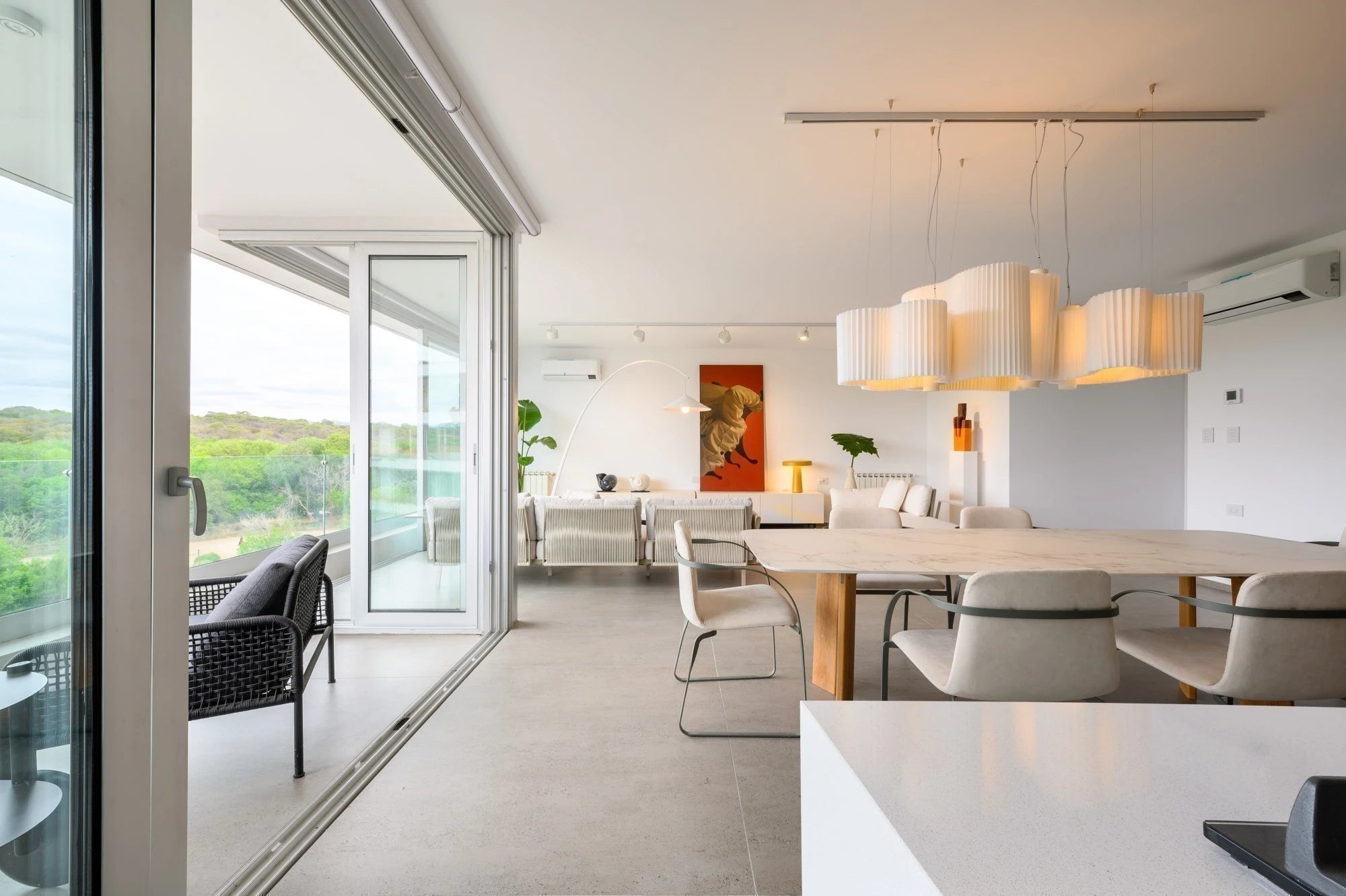 Dekton Kairos22 kitchen island with light gray finish and clean edges — premium dekton surfaces fabricated and installed by Signature Stone LV