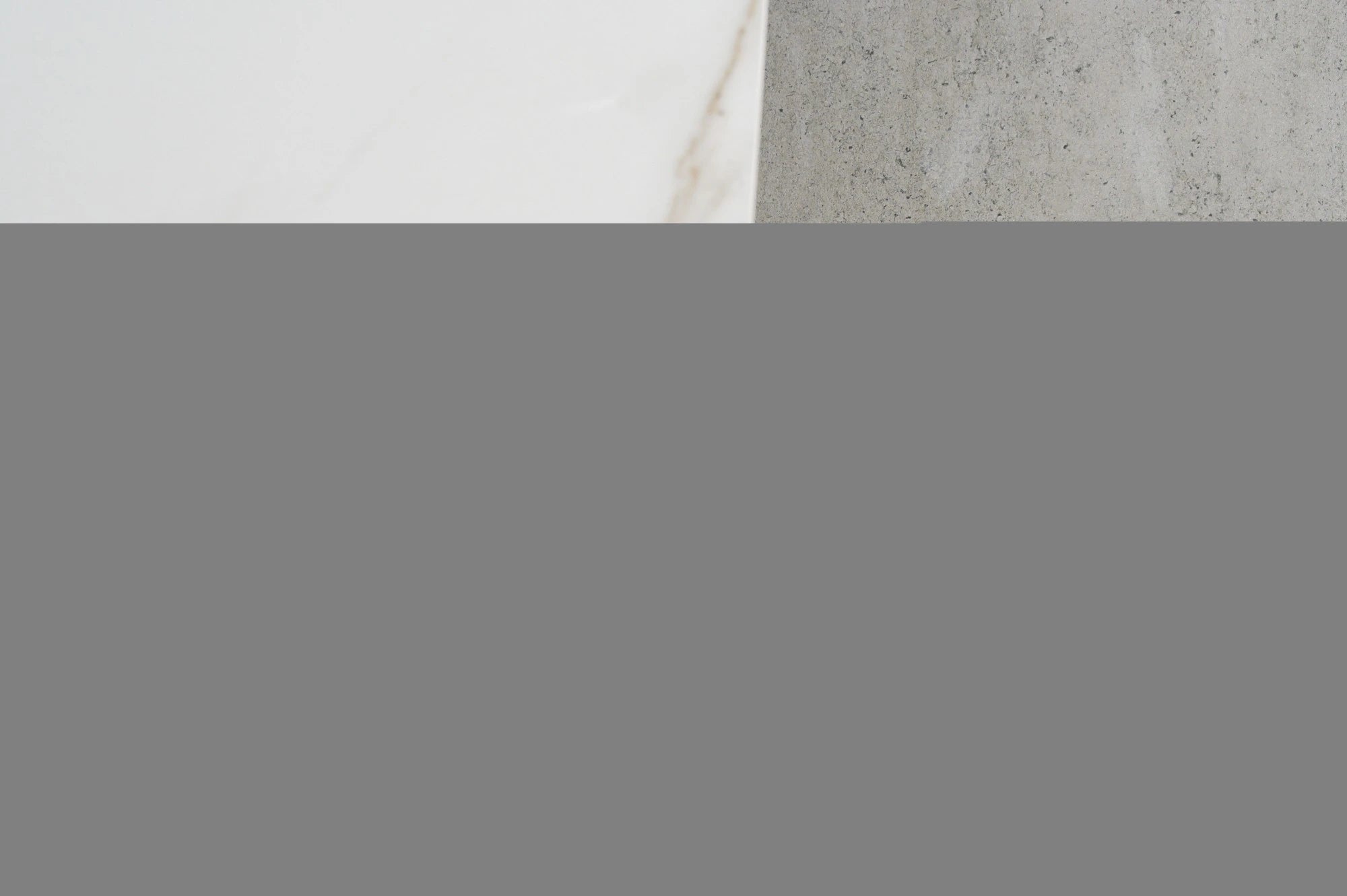 Dekton Kairos22 countertop with light gray finish and subtle veining — premium dekton surfaces fabricated and installed by Signature Stone LV