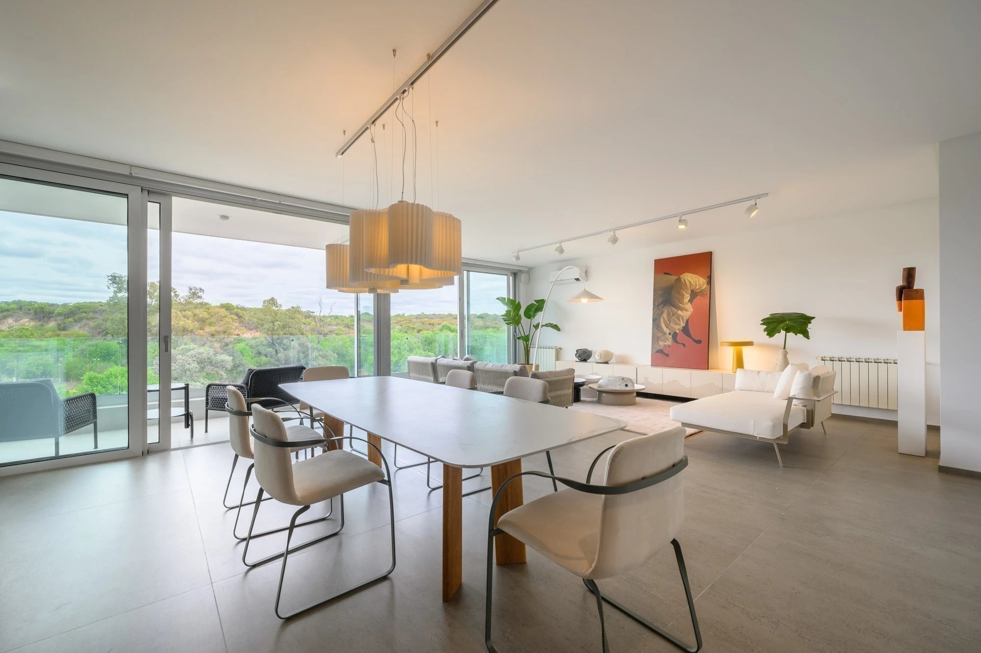 Dekton Kairos22 dining table surface with white finish and wood legs — premium dekton kitchen countertops by Signature Stone Las Vegas