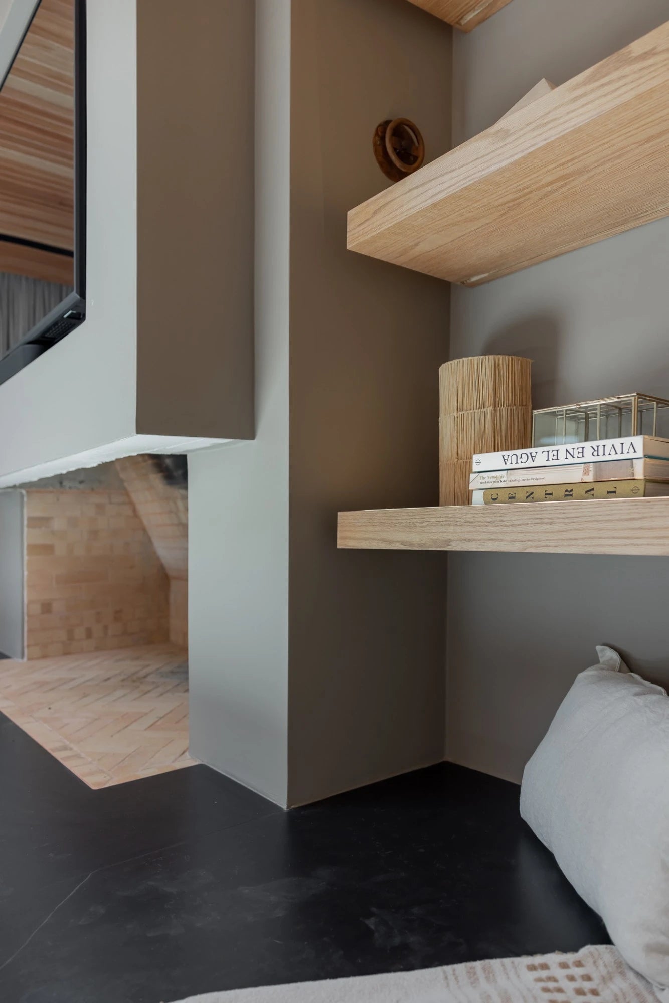 Dekton Kelya floating shelves with warm wood grain finish and clean edges — premium dekton surfaces fabricated and installed by Signature Stone LV