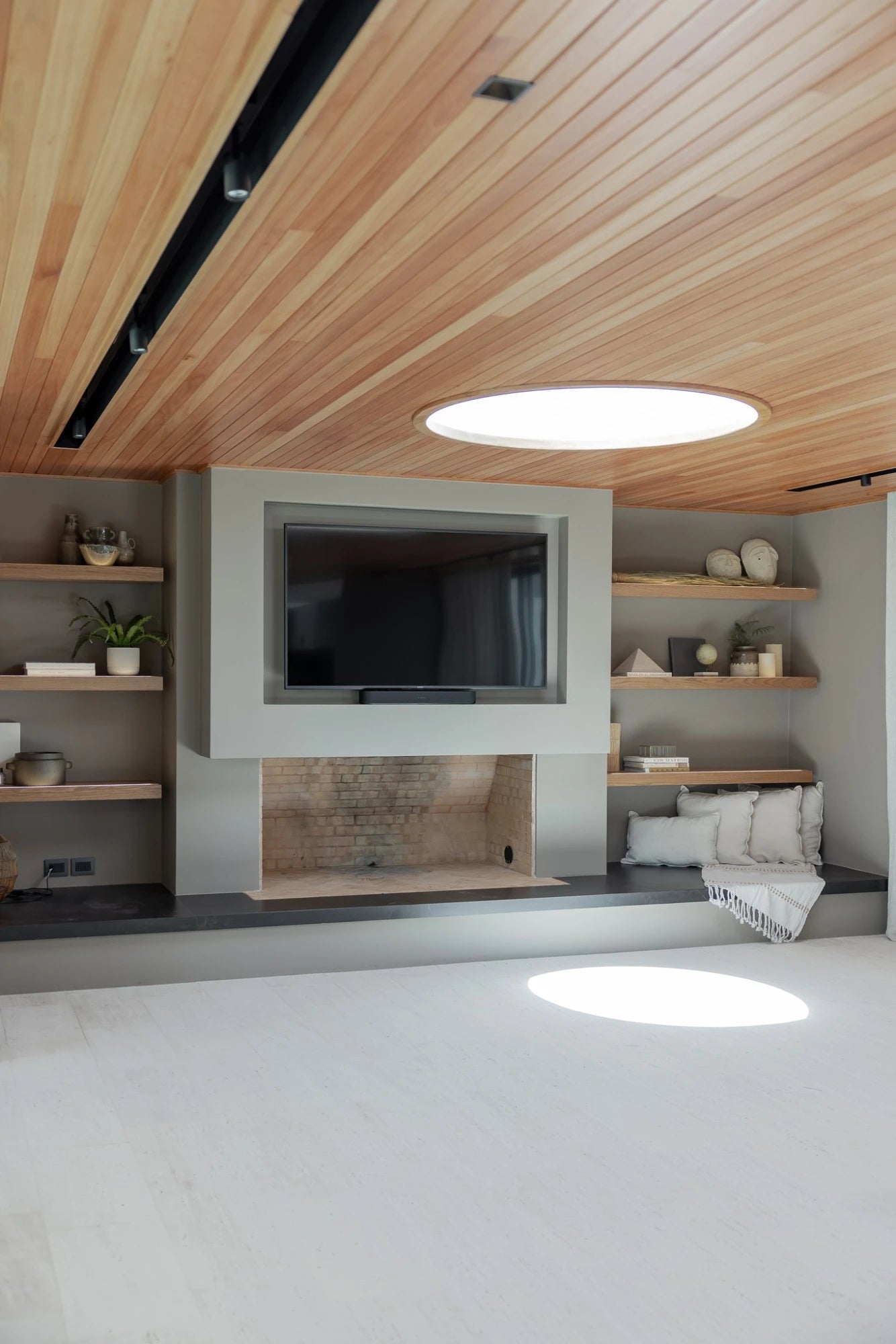 Dekton Kelya surfaces in modern living room with light gray finish and clean lines — premium dekton countertops installed by Signature Stone Las Vegas