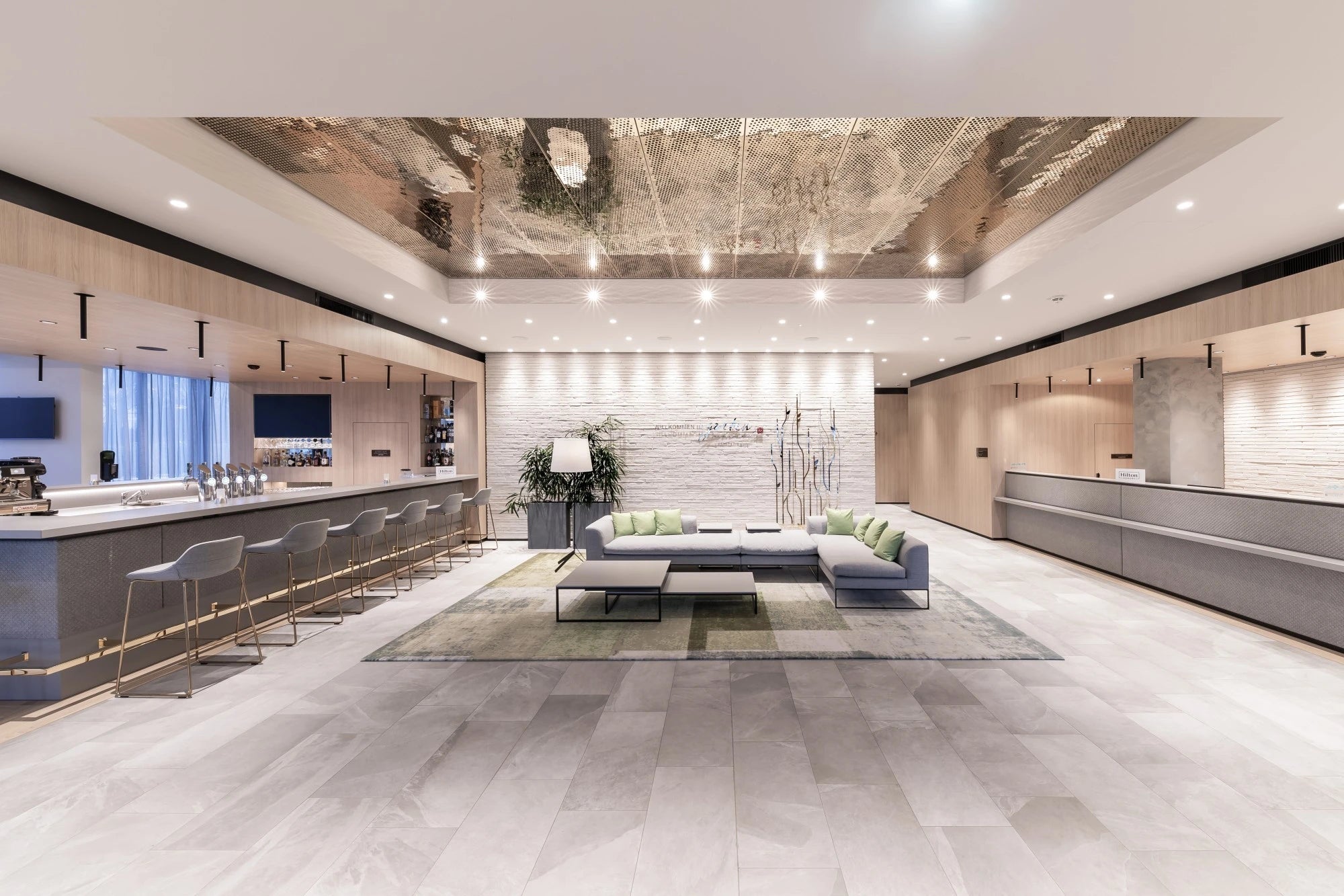 Silestone Kensho quartz kitchen island with waterfall edge and white cabinets — premium quartz countertops near me by Signature Stone Las Vegas