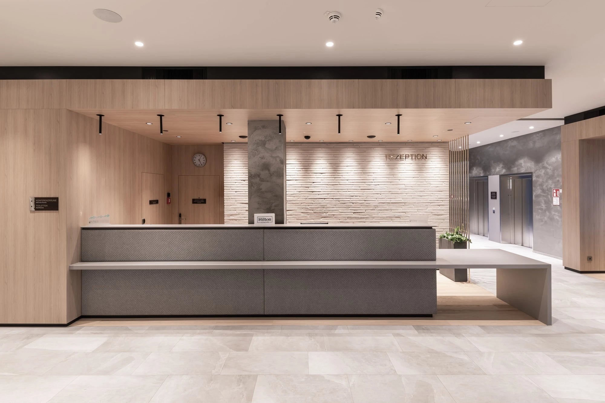 Silestone Kensho reception desk with sleek gray finish and clean lines — modern quartz countertops installed by Signature Stone Las Vegas