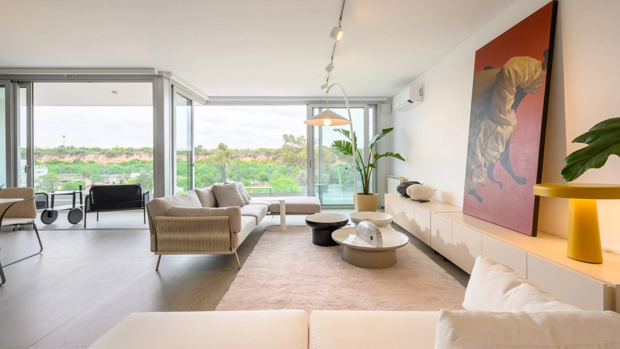 Dekton Keon surfaces in modern living room with sleek white finish and clean lines — premium dekton surfaces fabricated and installed by Signature Stone LV