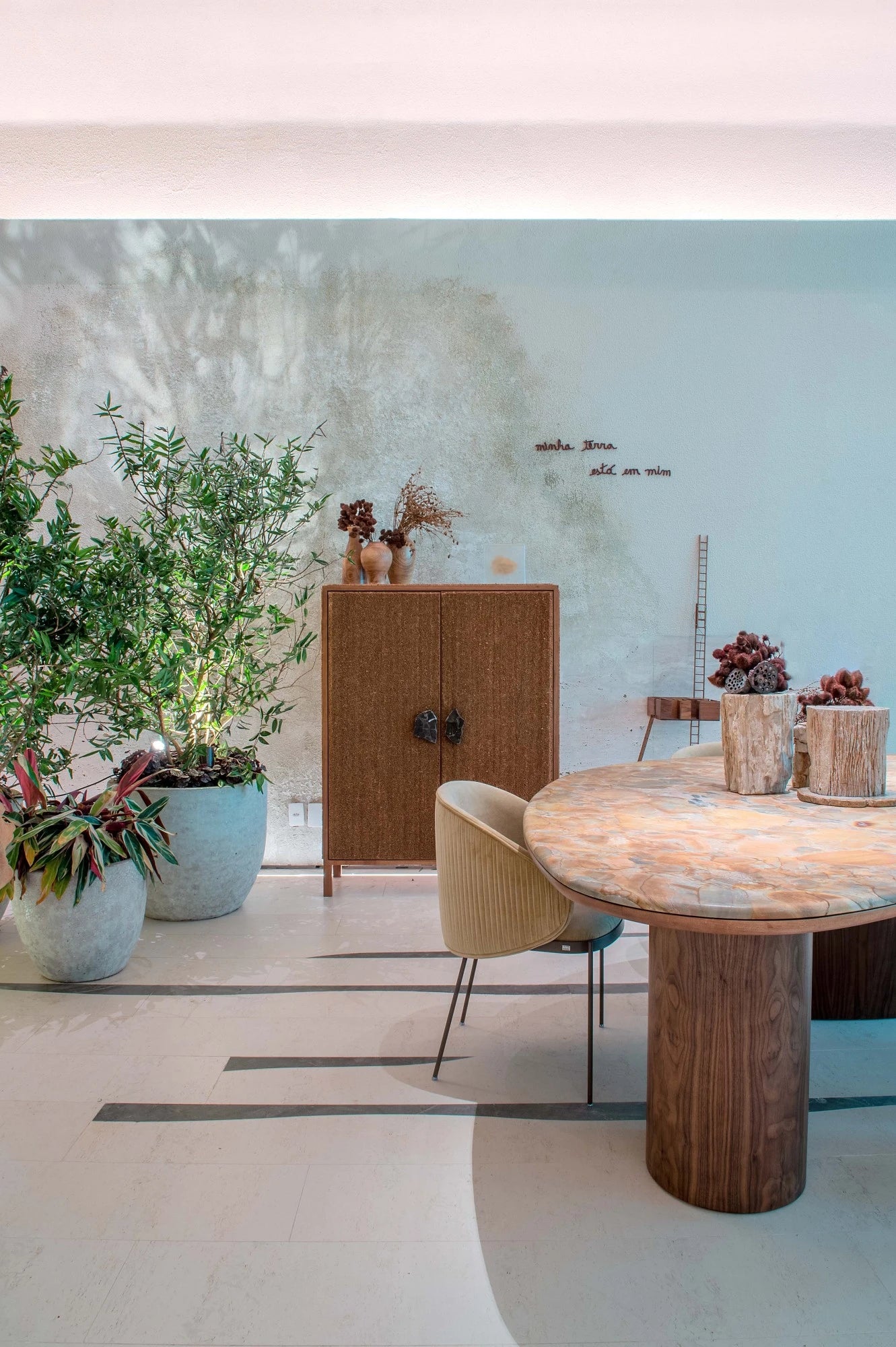 Dekton Kira dining table with warm neutral tones and smooth finish in modern interior — dekton countertops installed by Signature Stone Las Vegas