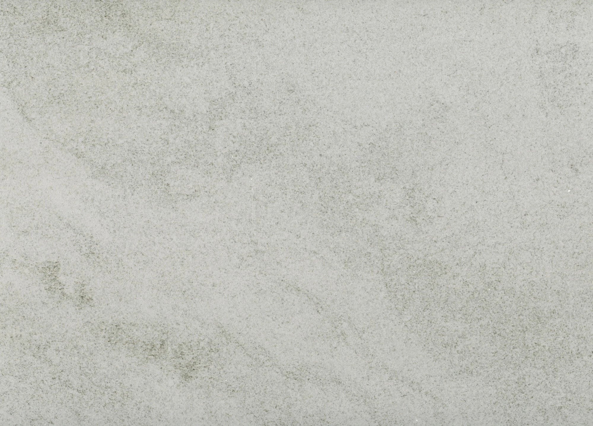 Dekton Kovik surface with light gray textured finish and subtle speckled pattern — premium dekton countertops installed by Signature Stone Las Vegas