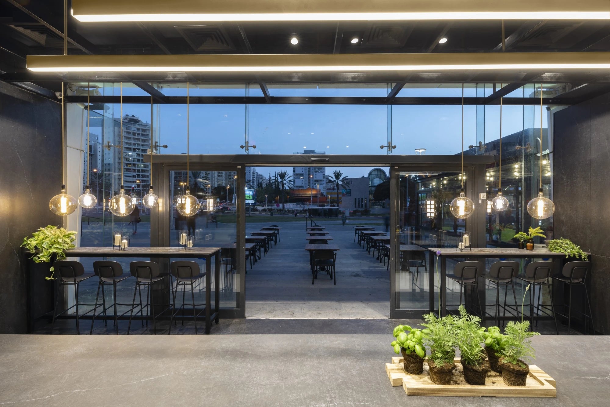 Dekton Kovik bar tops with dark matte finish in modern restaurant setting — premium dekton countertops installed by Signature Stone Las Vegas