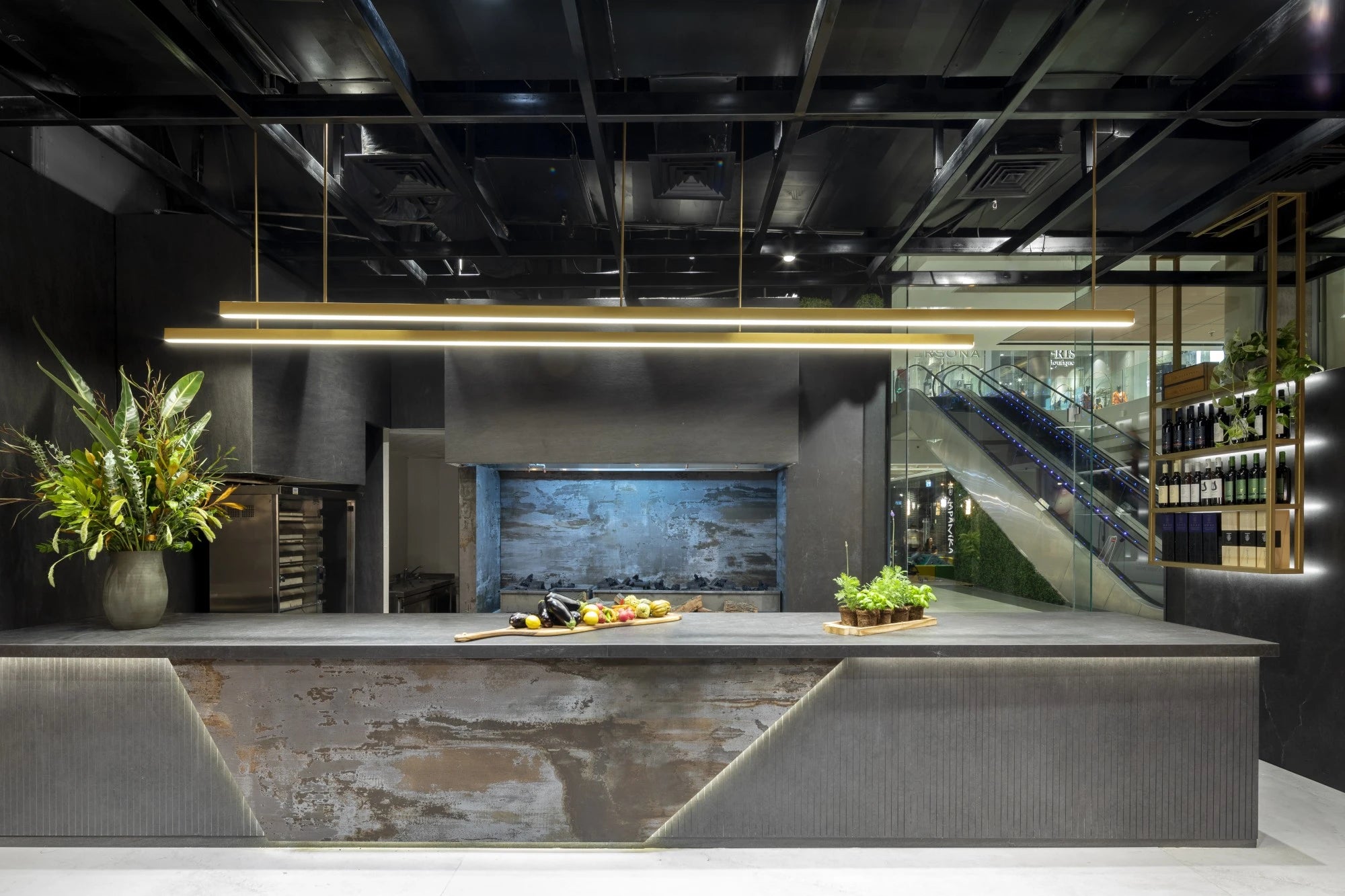 Dekton Kovik kitchen island with concrete-look finish and waterfall edge — premium dekton surfaces fabricated and installed by Signature Stone LV