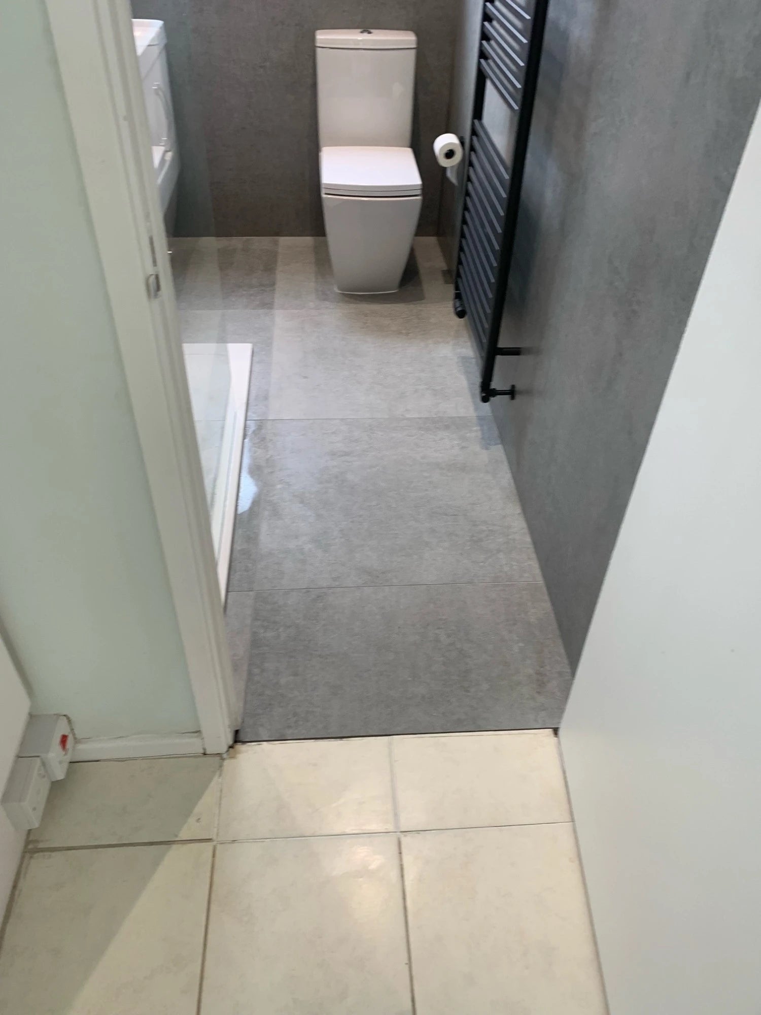Dekton Kreta flooring with gray marble-look finish and matte texture — dekton countertops installed by Signature Stone Las Vegas