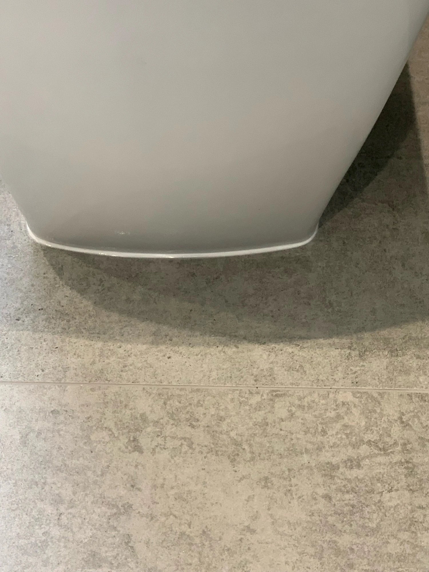Dekton Kreta surface with light cream finish and rounded edge detail — premium dekton countertops installed by Signature Stone Las Vegas
