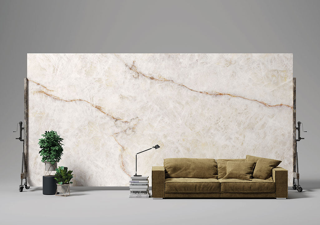 Lumix quartz wall feature with white marble veining and gold accents — custom countertops fabricated and installed by Signature Stone LV