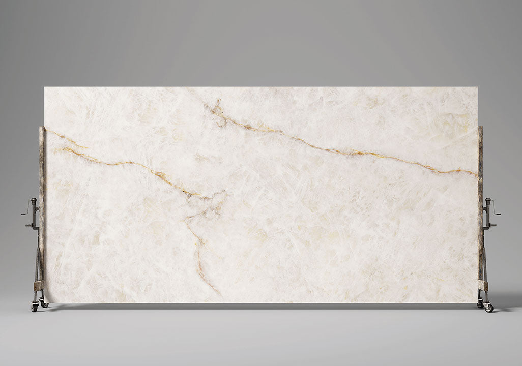 Lumix quartz slab with white base and golden veining — ideal for custom countertops fabricated and installed by Signature Stone LV