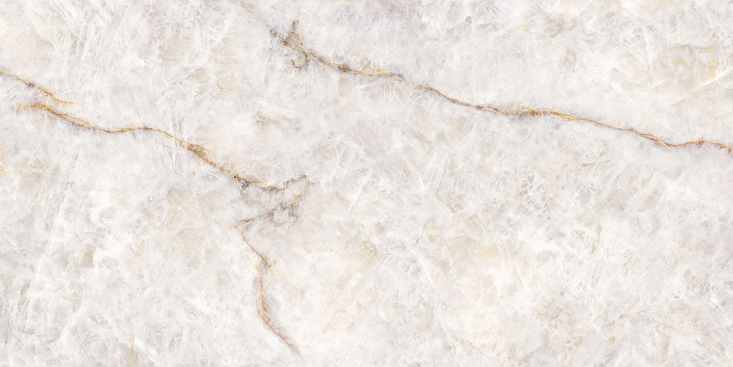 Lumix quartz surface with soft white base and subtle golden veining in polished finish — premium countertop fabrication by Signature Stone Las Vegas