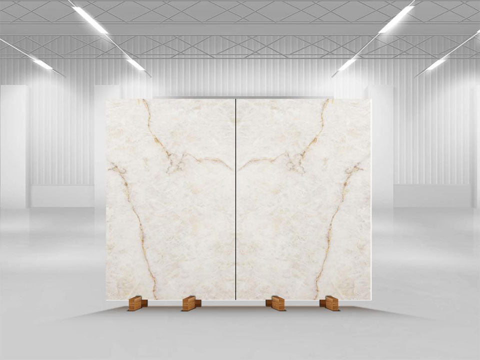 Lumix quartz slabs with white base and gold veining in warehouse setting — premium stone countertops installed by Signature Stone Las Vegas