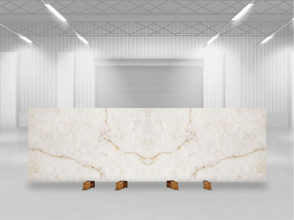 White marble slab with gold veining displayed in warehouse — expert countertop fabrication by Signature Stone Las Vegas
