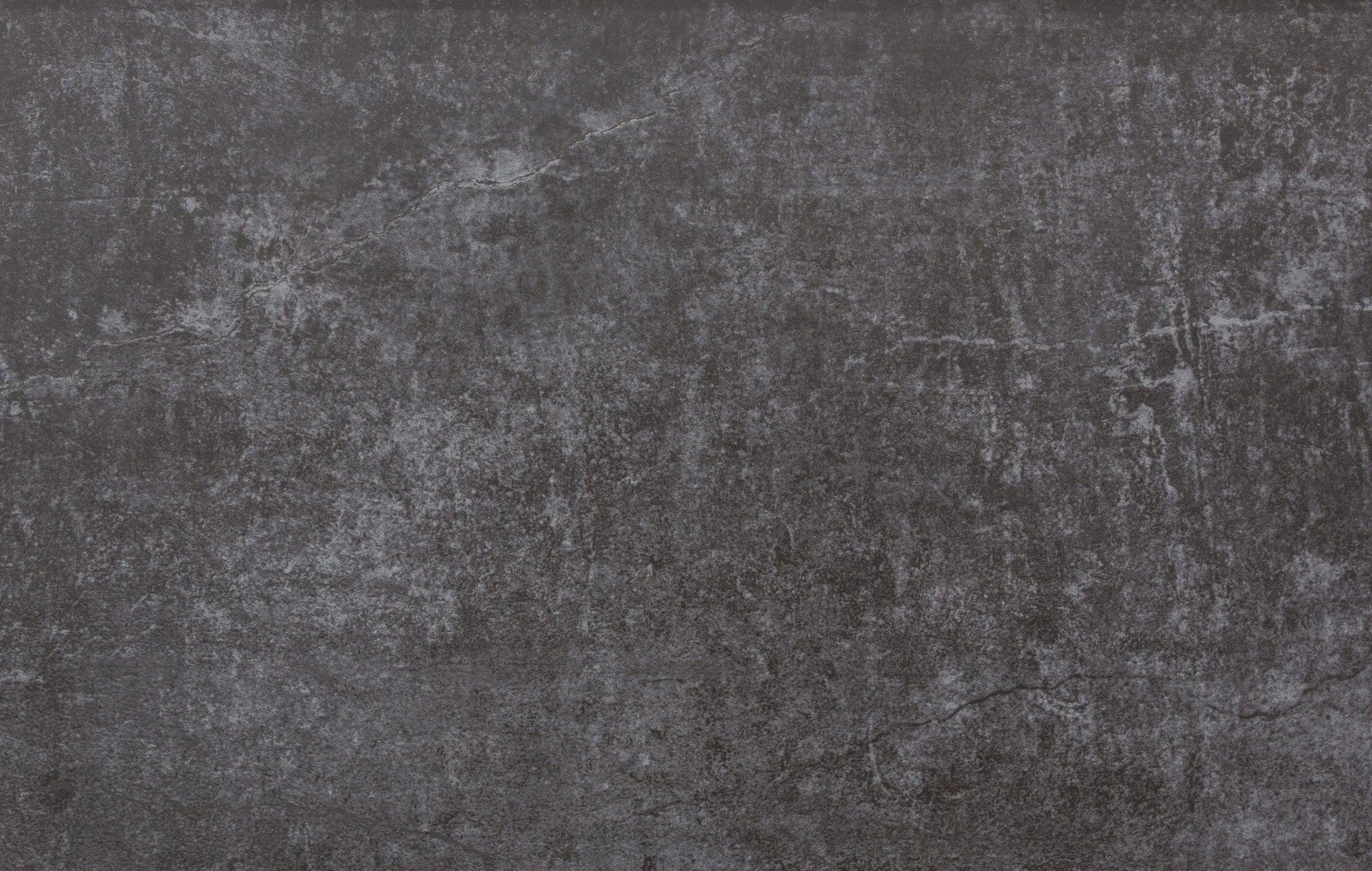 Dekton Laos surface with dark charcoal gray finish and subtle natural stone texture — premium dekton kitchen countertops by Signature Stone Las Vegas