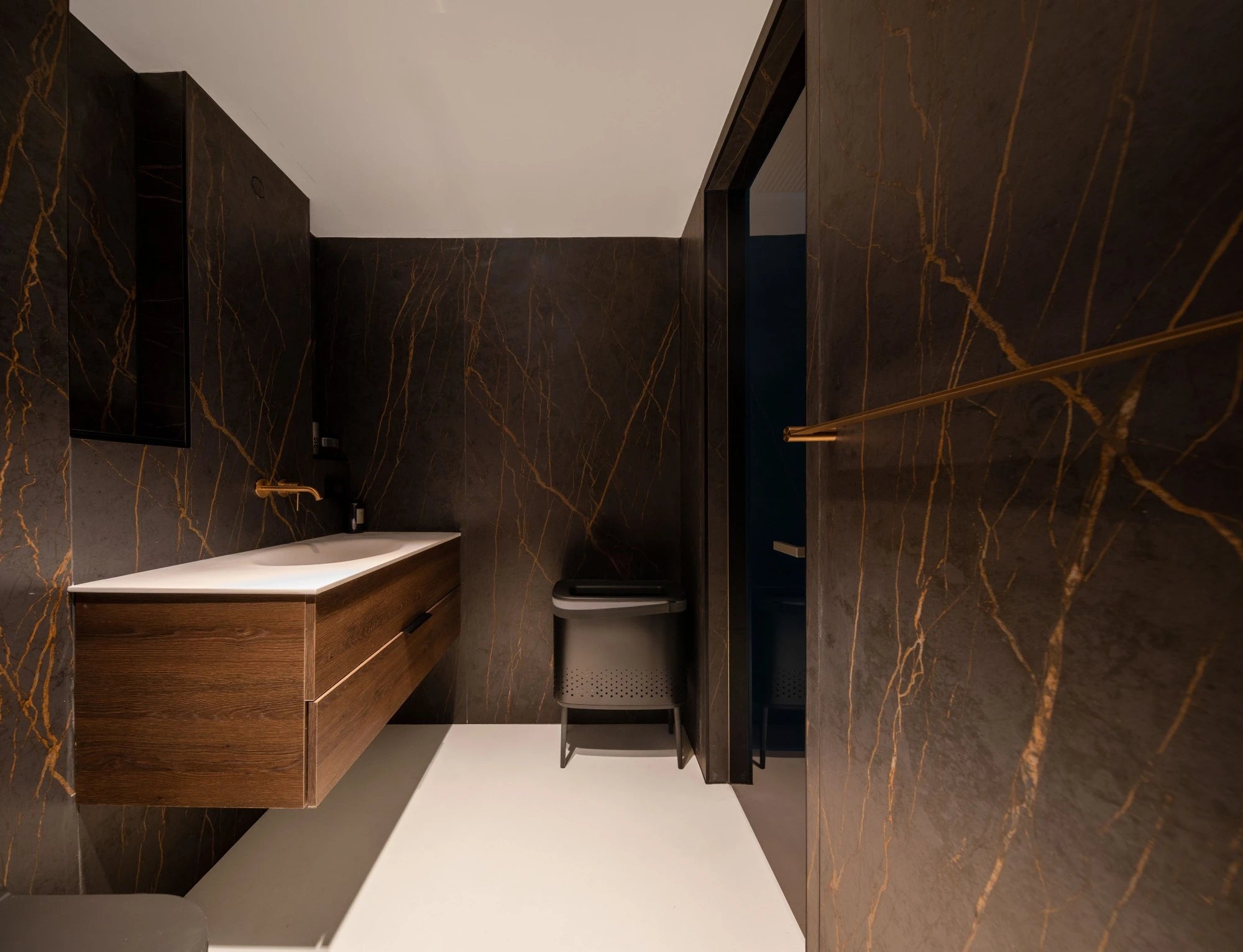 Dekton Laurent bathroom vanity with rich brown veining and matte finish — premium dekton kitchen countertops by Signature Stone Las Vegas