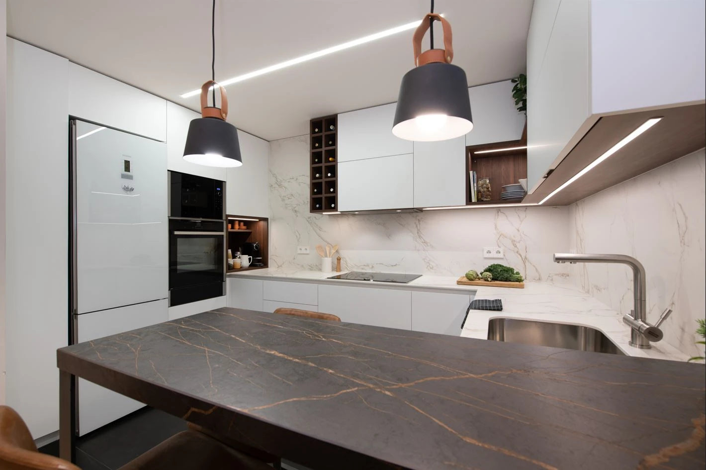 Dekton Laurent kitchen island with dark charcoal surface and golden veining — premium dekton countertops installed by Signature Stone Las Vegas