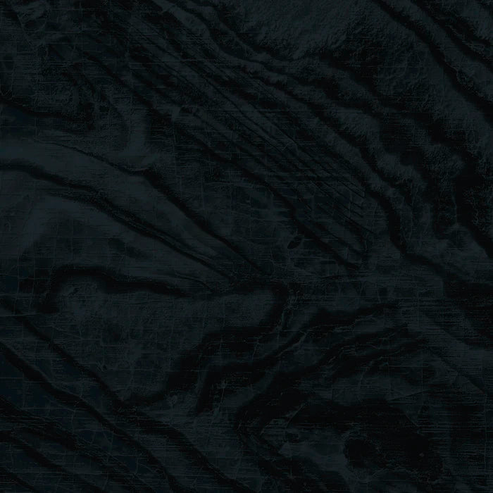 Dekton Liquid Embers slab surface featuring deep charcoal tones with subtle textural veining — premium dekton countertops installed by Signature Stone Las Vegas