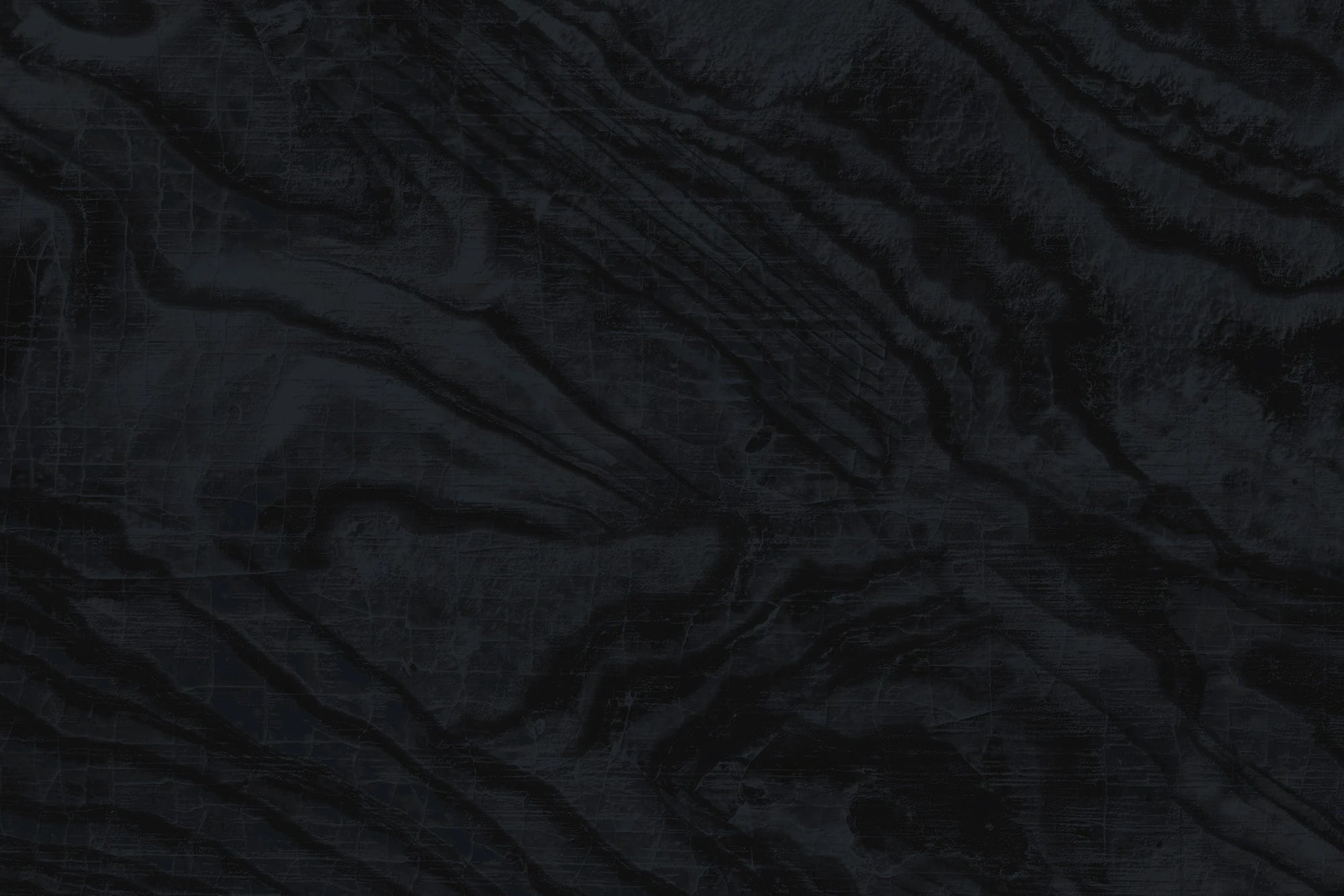 Dekton Liquid Embers surface with dark charcoal finish and dramatic veining patterns — premium dekton countertops installed by Signature Stone Las Vegas