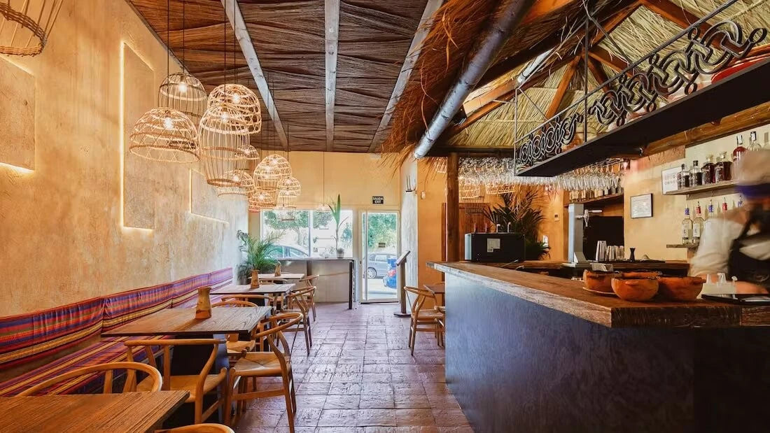 Dekton Liquid Embers bar counter with warm orange tones and smooth finish in restaurant setting — dekton countertops installed by Signature Stone Las Vegas
