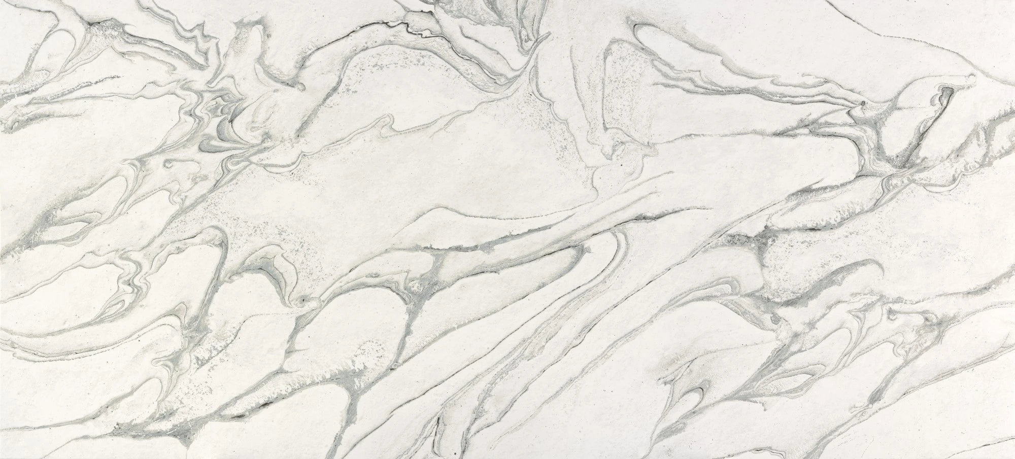 Dekton Liquid Sky surface with flowing white and gray marble-like veining — premium dekton surfaces fabricated and installed by Signature Stone LV