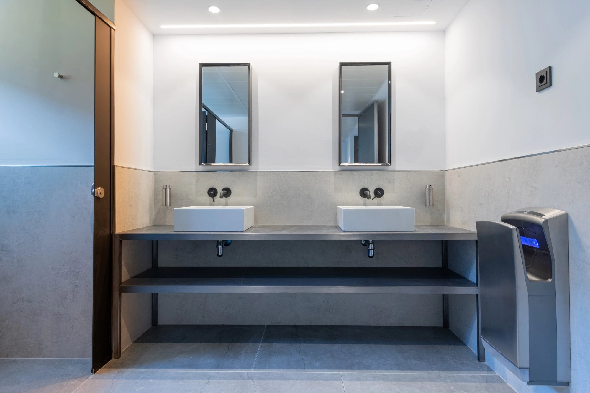 Dekton Lunar bathroom vanity with dual vessel sinks and matte gray finish — premium dekton surfaces fabricated and installed by Signature Stone LV