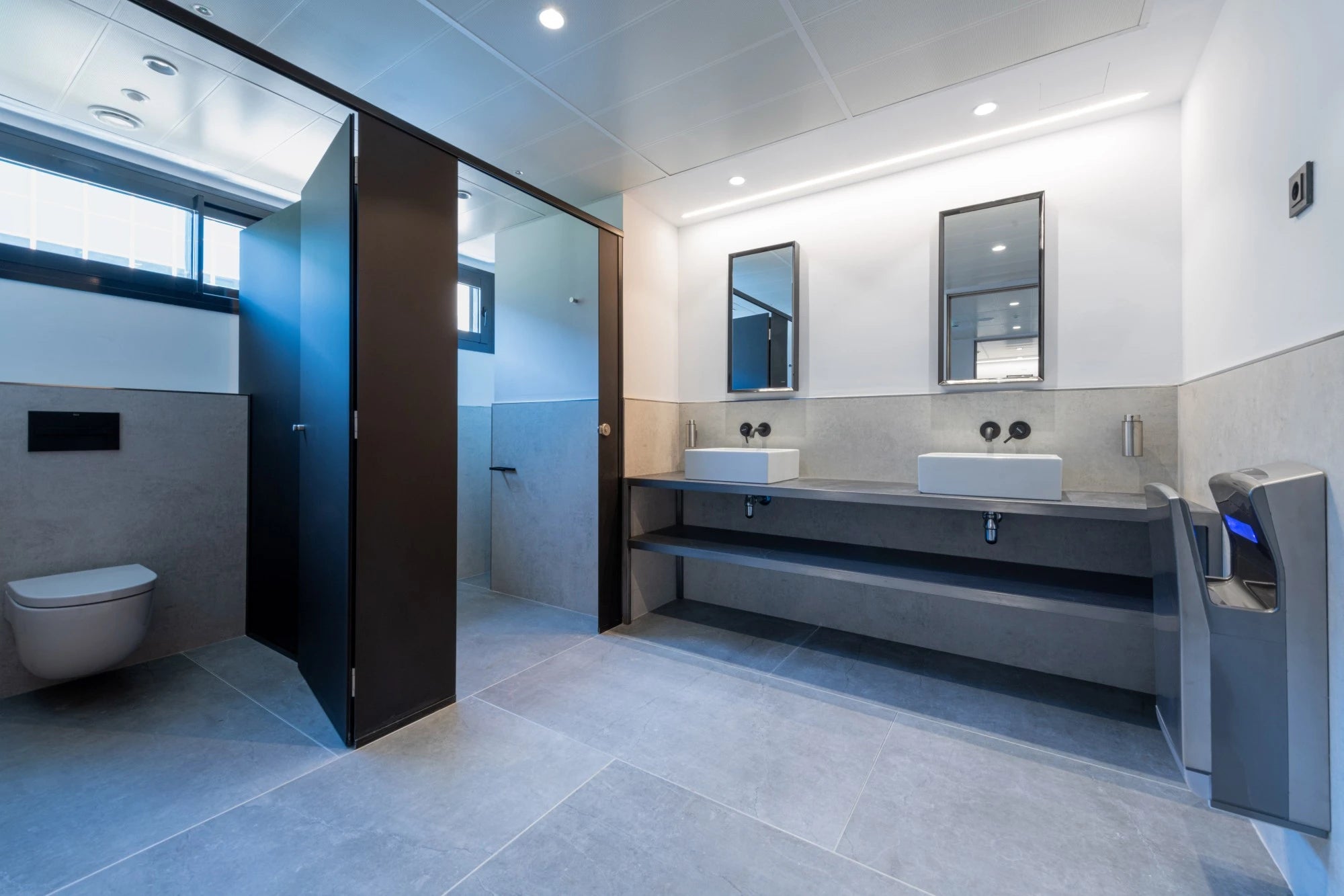 Dekton Lunar bathroom vanity with dark gray finish and floating design — premium dekton countertops installed by Signature Stone Las Vegas