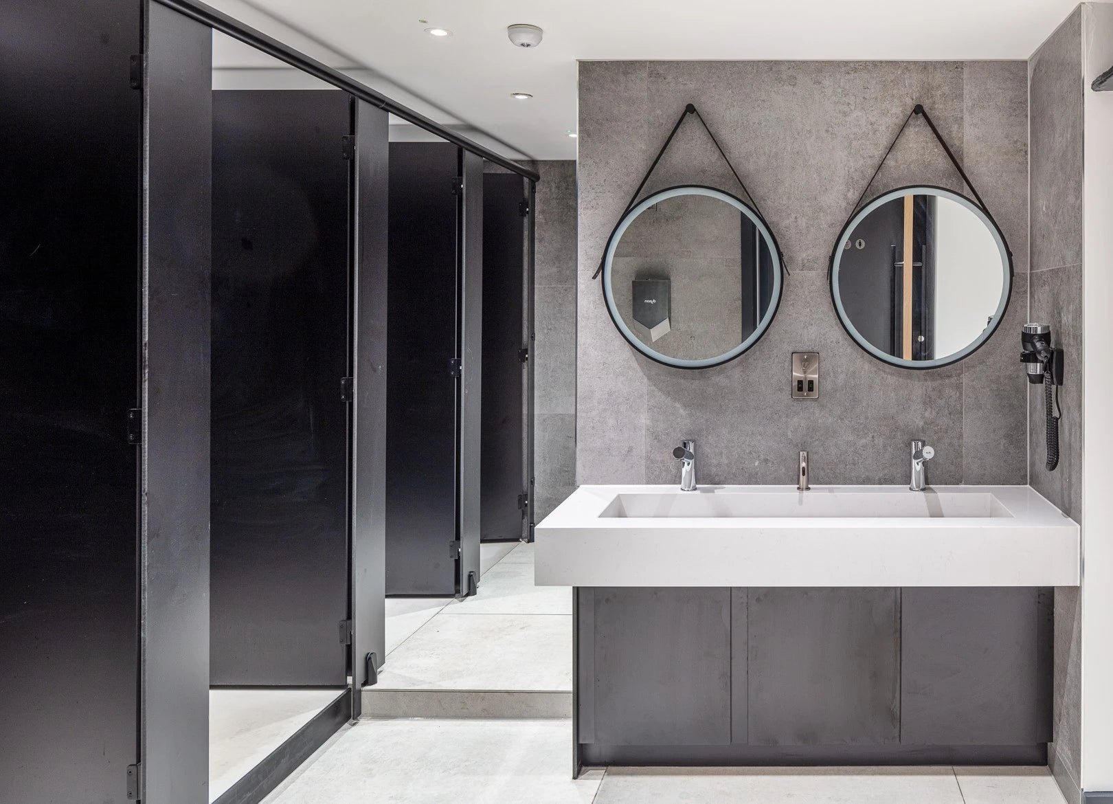Dekton Lunar bathroom vanity with white integrated sink and sleek finish — premium dekton kitchen countertops by Signature Stone Las Vegas
