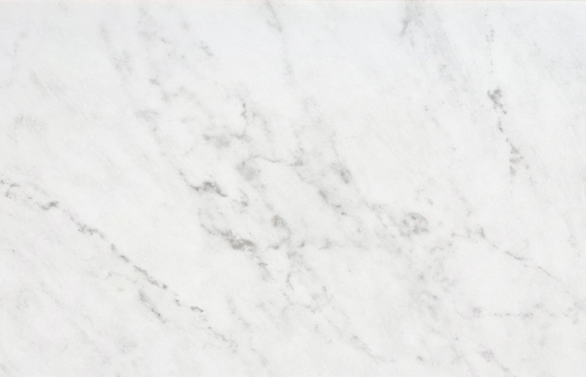 Dekton Marina countertop surface with light gray base and subtle white veining — premium dekton surfaces fabricated and installed by Signature Stone LV