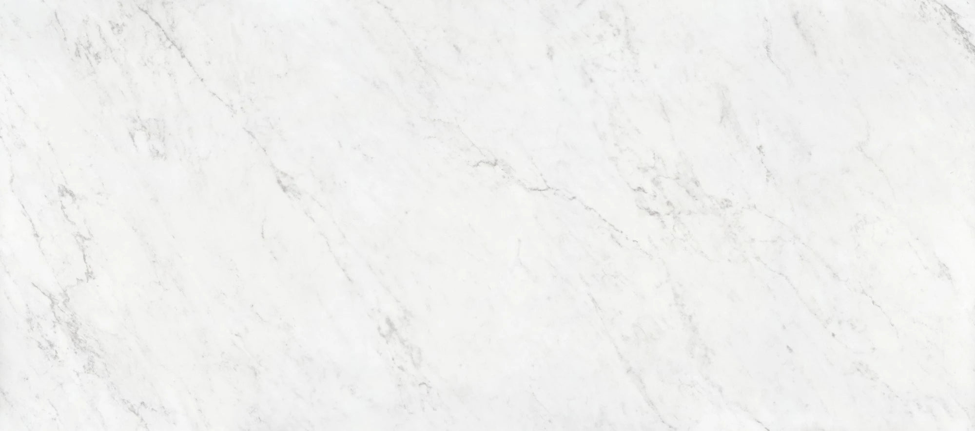 Dekton Marina kitchen island with white marble-look surface and waterfall edge — premium dekton countertops installed by Signature Stone Las Vegas