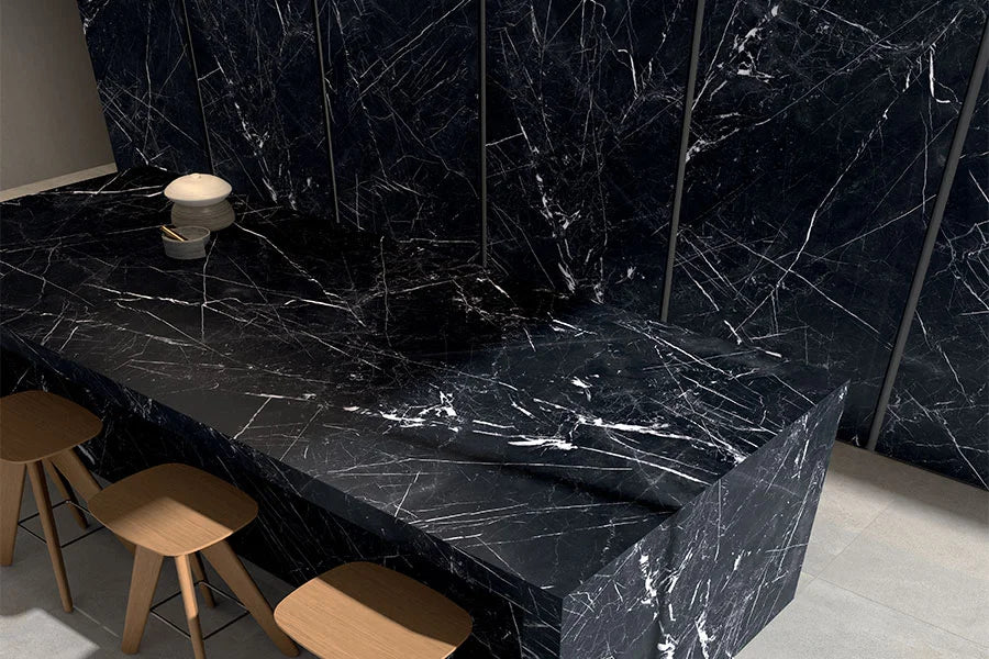 Marquinia Noir bathroom vanity with dramatic black marble veining and sleek edges — luxury stone countertops installed by Signature Stone Las Vegas