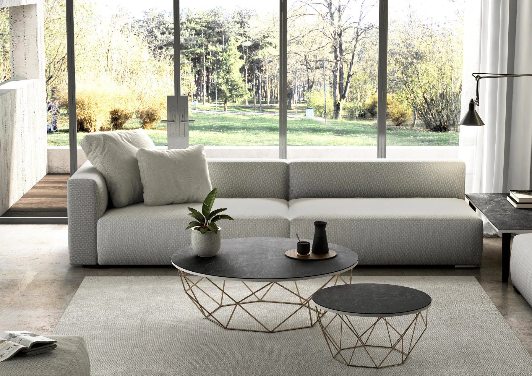 Dekton furniture coffee tables with dark matte finish and geometric wire bases in modern living room — dekton countertops installed by Signature Stone Las Vegas