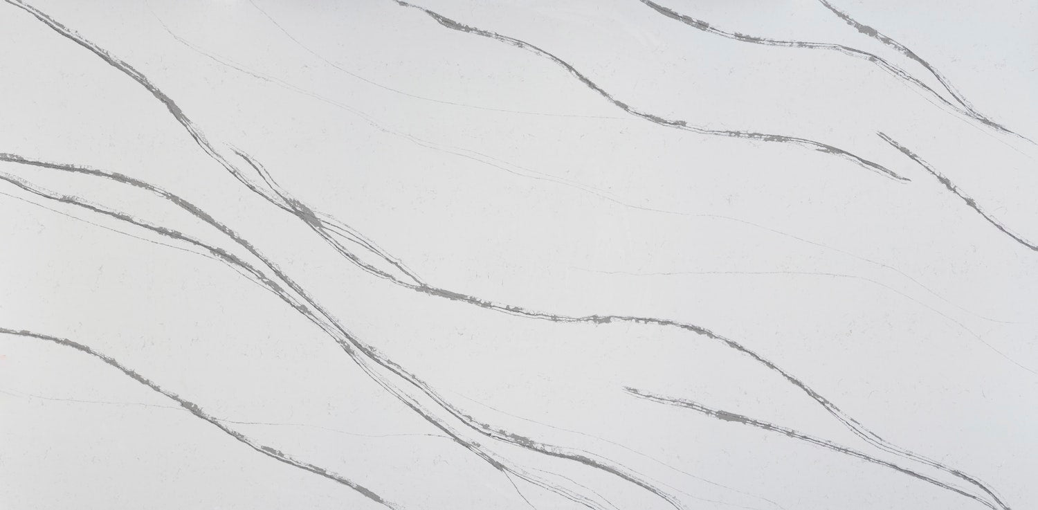 Silestone Et Bella surface with white base and subtle gray veining in polished finish — engineered quartz countertops fabricated and installed by Signature S...