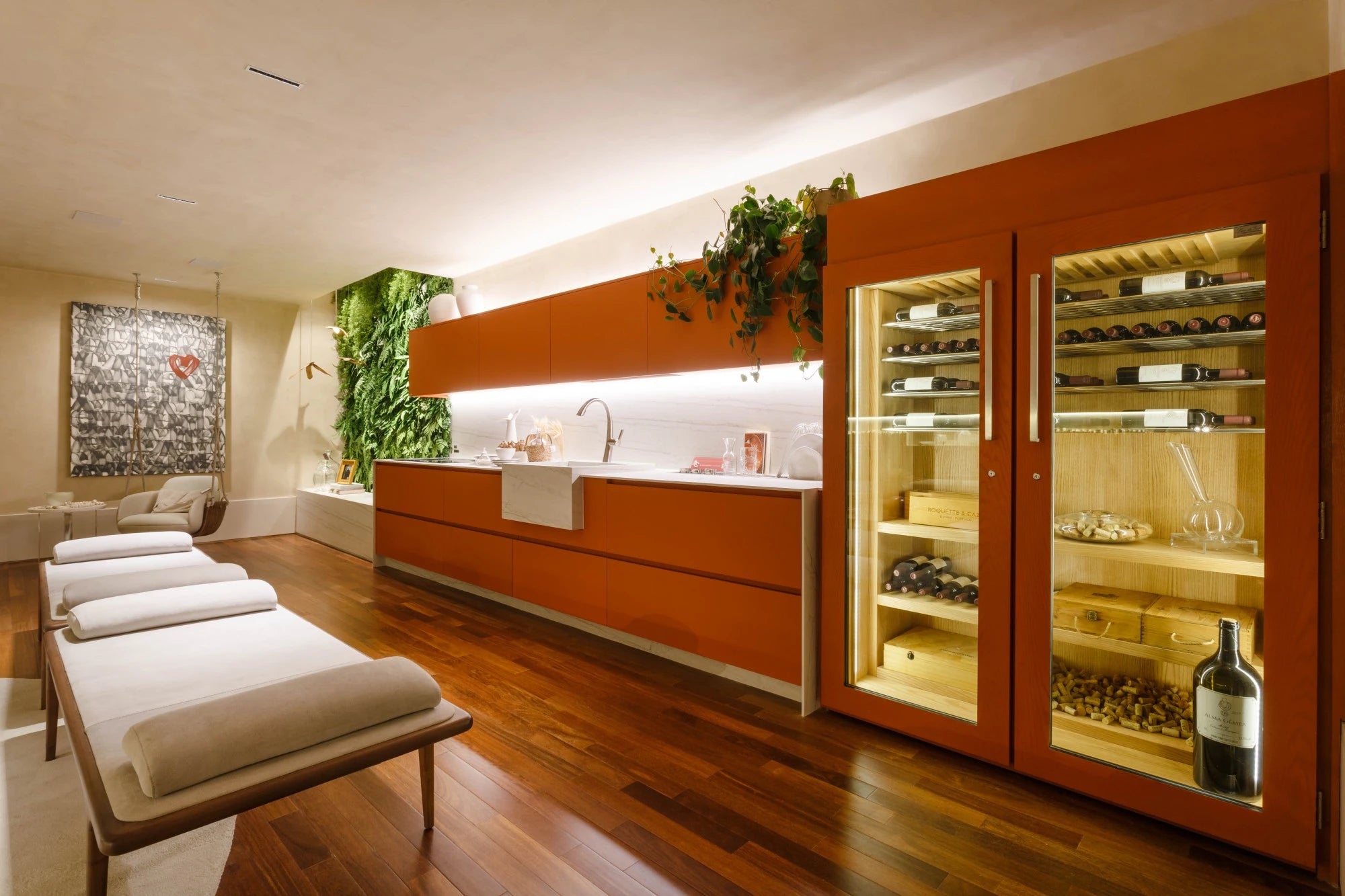 Dekton Neural kitchen island with clean white surface and orange cabinetry — premium dekton countertops installed by Signature Stone Las Vegas