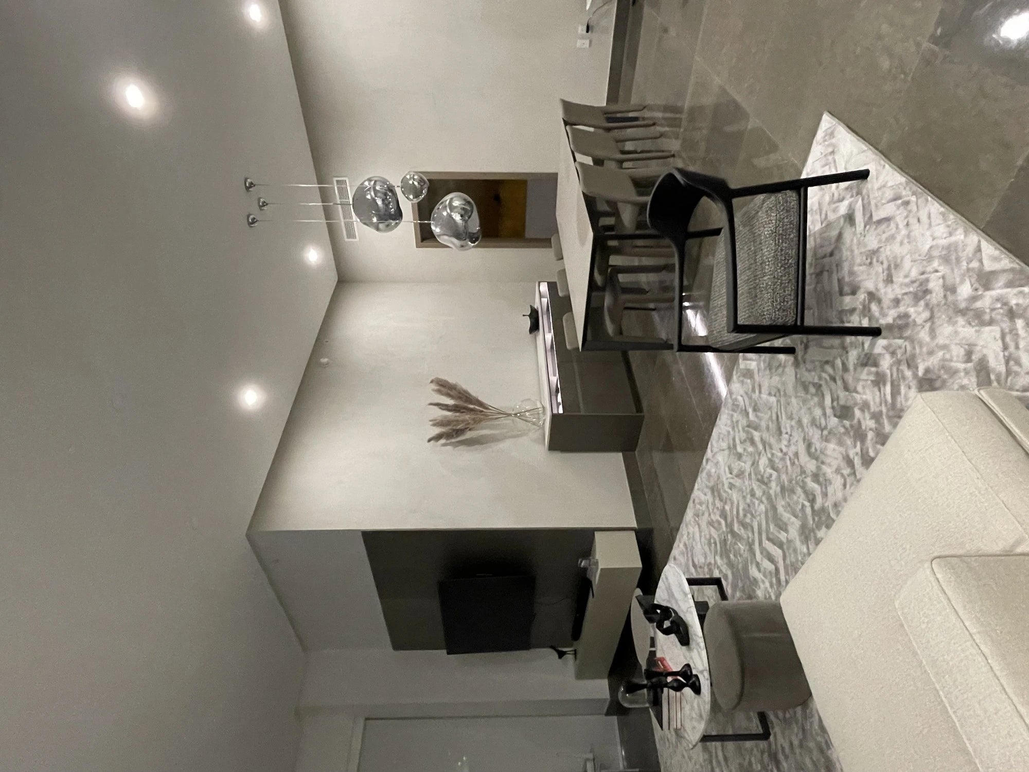 Dekton Neural kitchen island with sleek gray finish and waterfall edge — premium dekton kitchen countertops by Signature Stone Las Vegas