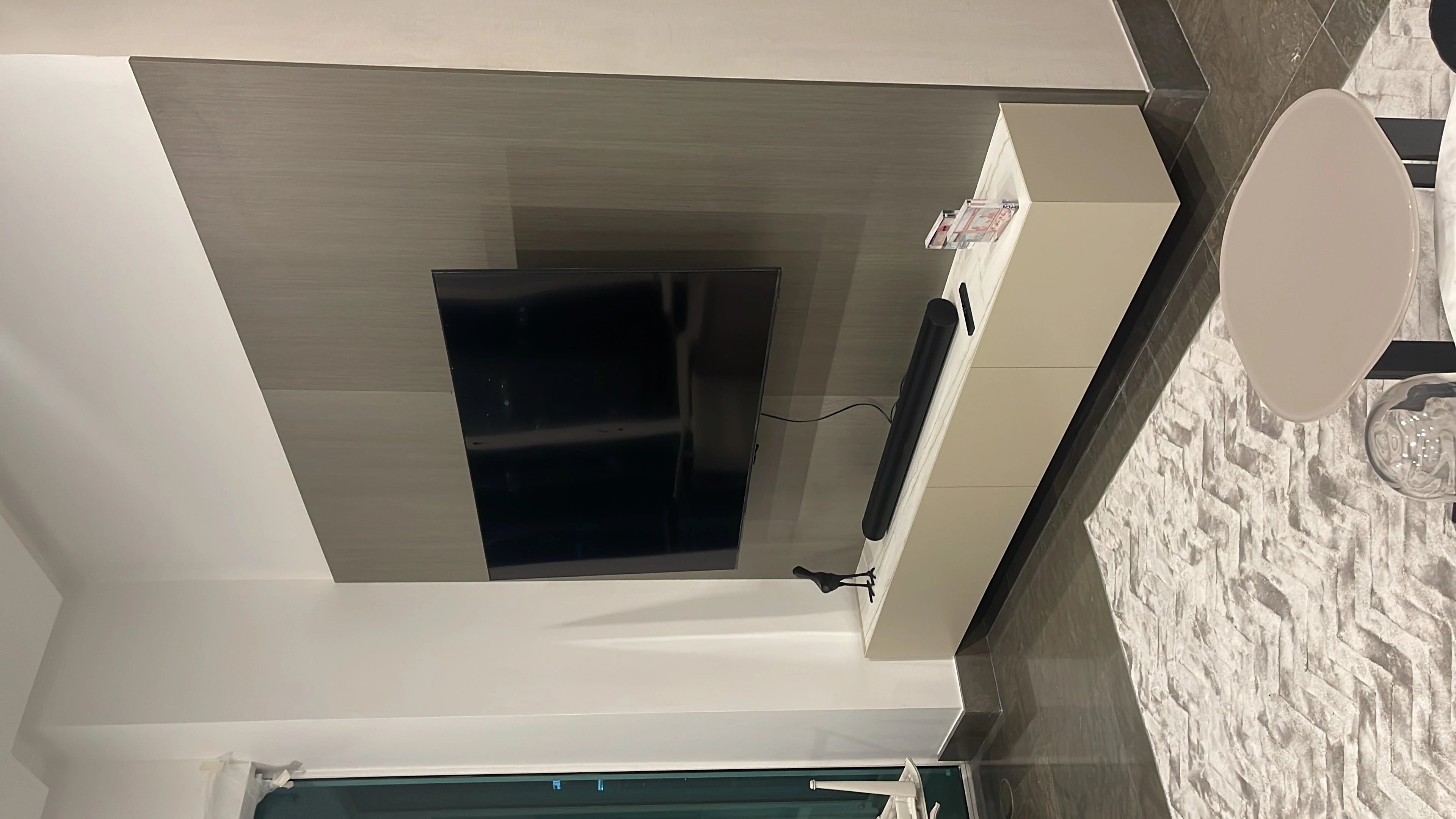 Dekton Neural fireplace surround with light neutral finish and clean lines — premium dekton surfaces fabricated and installed by Signature Stone LV