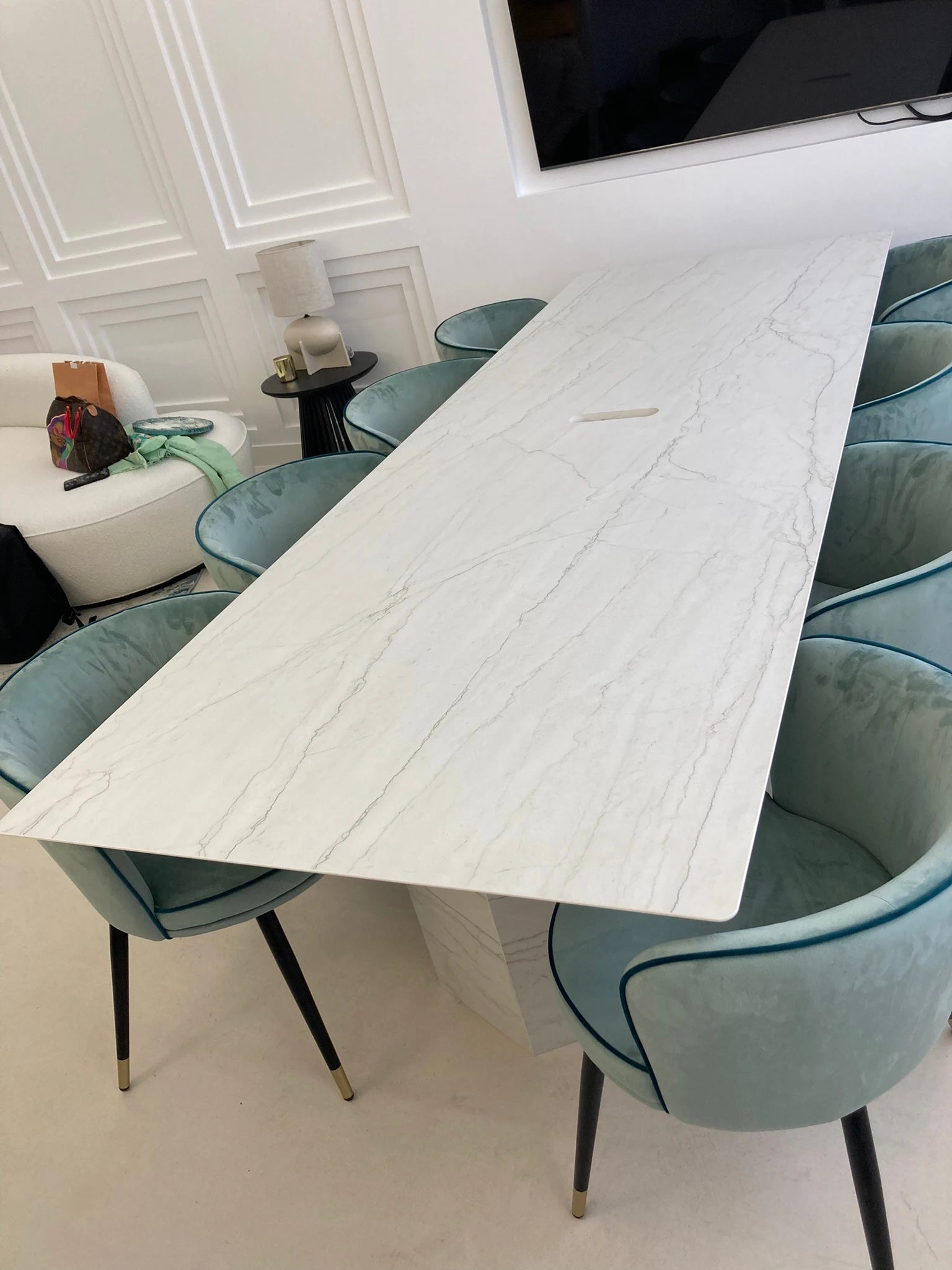 Dekton Neural dining table with white marble-look veining and sleek edges — premium dekton kitchen countertops by Signature Stone Las Vegas