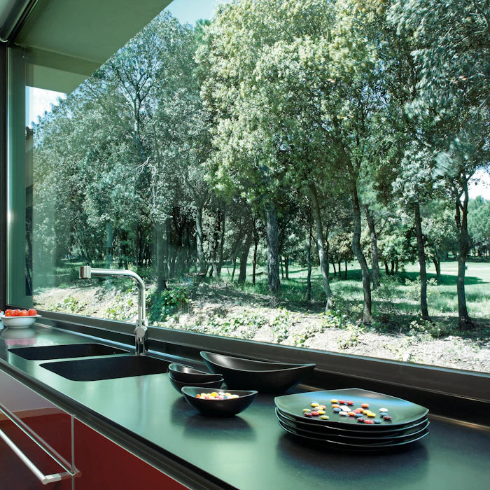 Silestone Night Tebas kitchen countertop with dark matte finish and undermount sink — engineered quartz countertops fabricated and installed by Signature Sto...