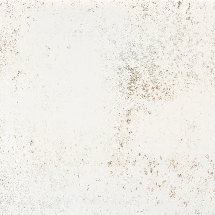 Dekton Nilium surface with soft white base and subtle brown speckled texture — premium dekton countertops installed by Signature Stone Las Vegas